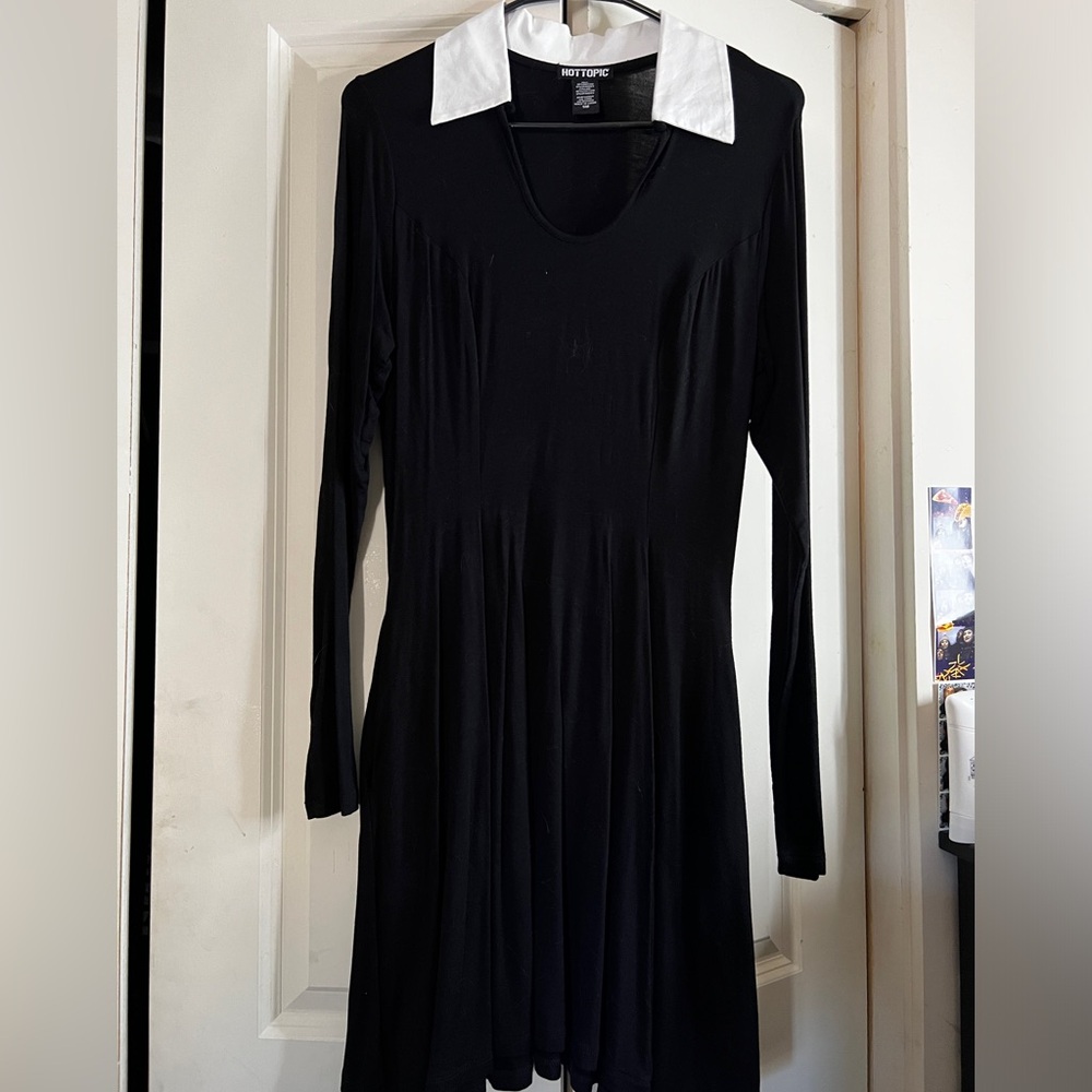 V neck Long sleeve black dress with white collar.